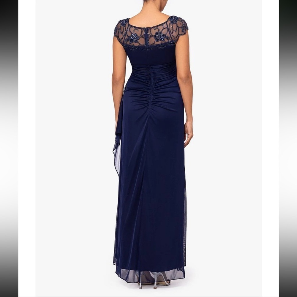 Xscape Beaded Yoke Cap Sleeve Round Neck Ruched Cascade Ruffle
Side Gown - Picture 6 of 12